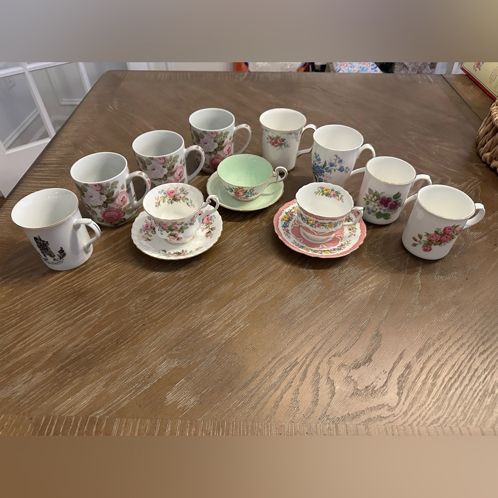 Assortment of tea, cups, and saucers, and standalone tea cups.